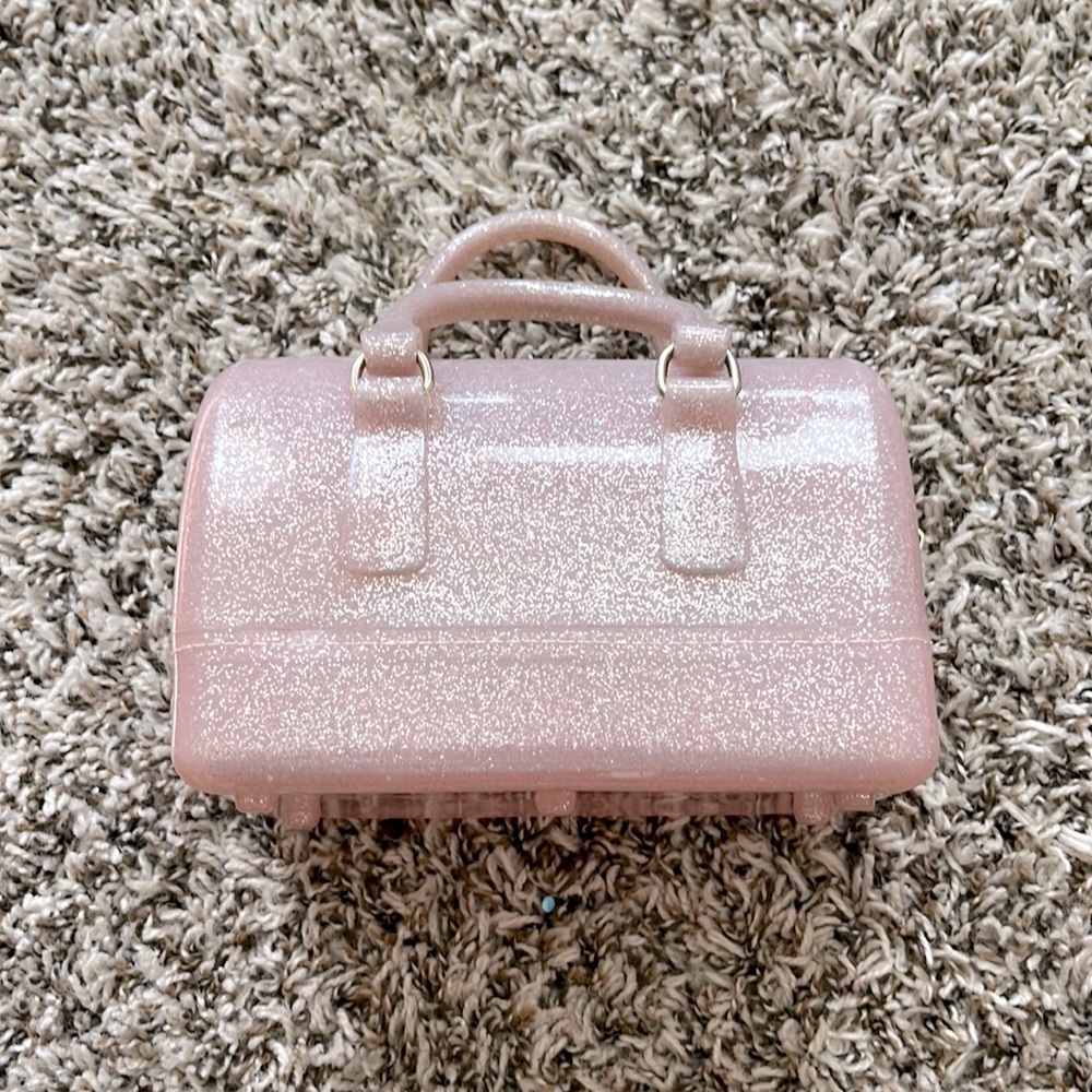 Adorable plastic pink purse